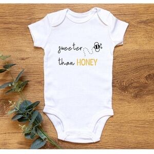 White Baby Onesie with Graphic Print